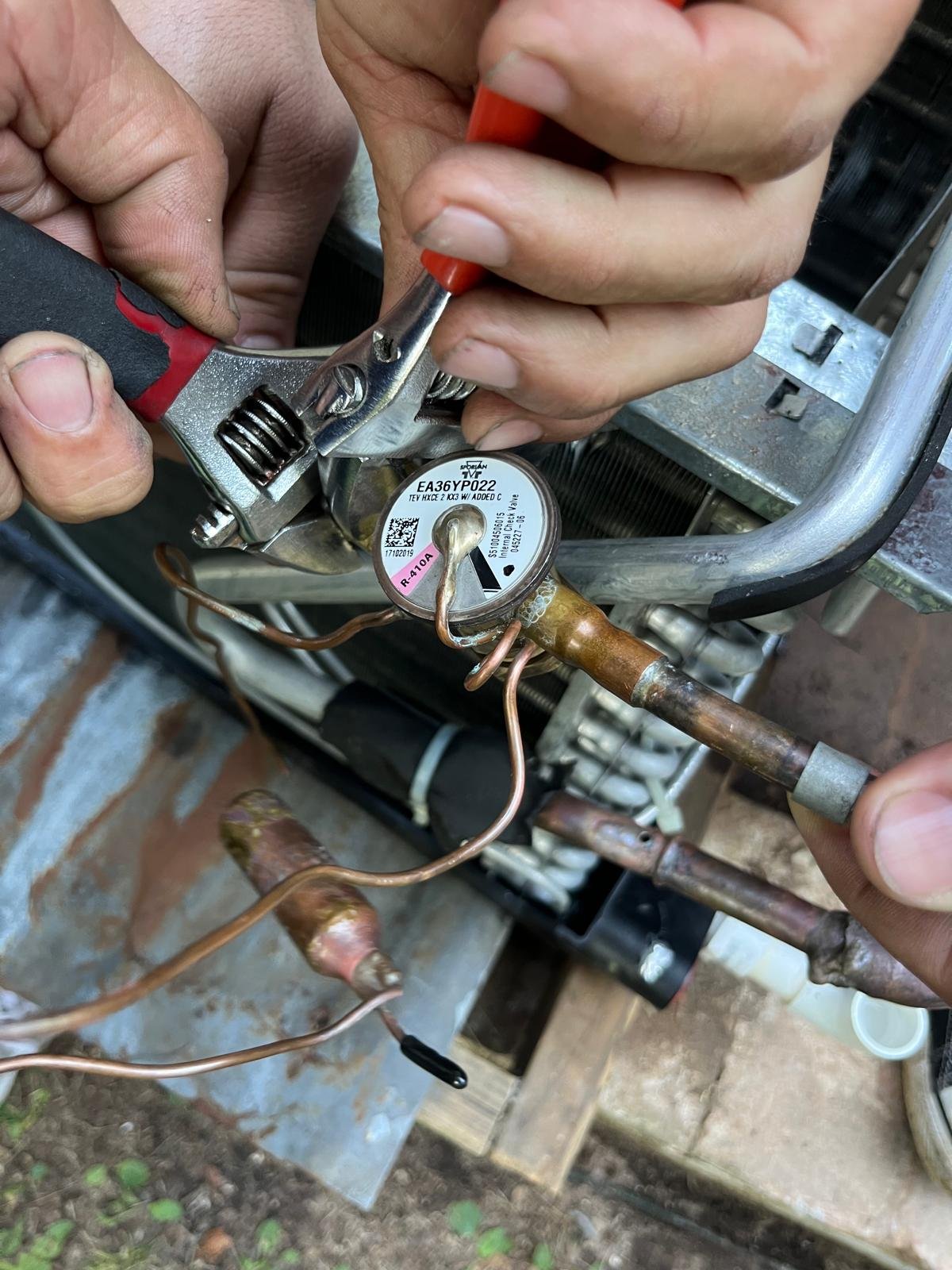 Servicing an AC valve with proper tools