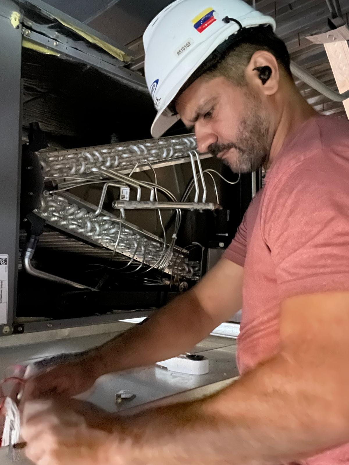 ClimaForce owner and lead technician working on a commercial HVAC unit